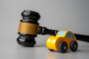 Reason suing California car dealership